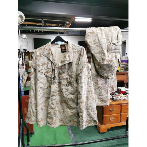 56b - American desert storm camo military uniform was exchanged with a British soldiers uniform