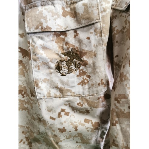 56b - American desert storm camo military uniform was exchanged with a British soldiers uniform