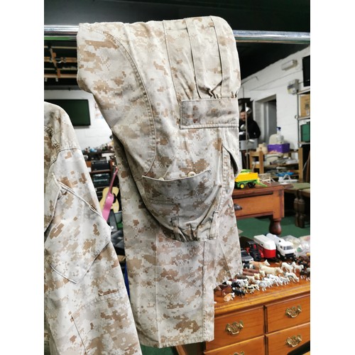 56b - American desert storm camo military uniform was exchanged with a British soldiers uniform