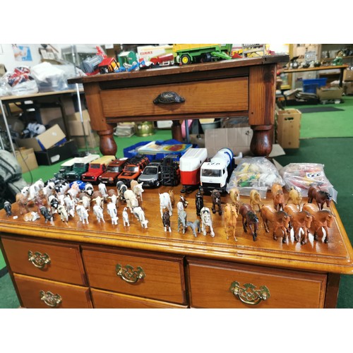 56c - Job lot of plastic farm animals mostly by Britains inc a large quantity of horses and cows