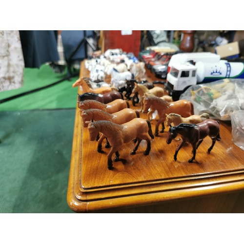 56c - Job lot of plastic farm animals mostly by Britains inc a large quantity of horses and cows