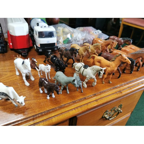 56c - Job lot of plastic farm animals mostly by Britains inc a large quantity of horses and cows