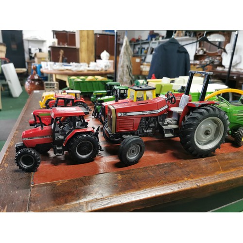 56e - Large collection of mostly diecast farm vehicles inc a good quantity of tractors and combine harvest... 