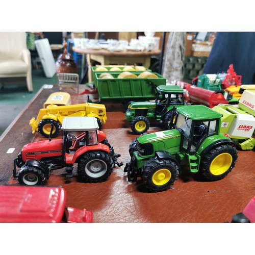 56e - Large collection of mostly diecast farm vehicles inc a good quantity of tractors and combine harvest... 