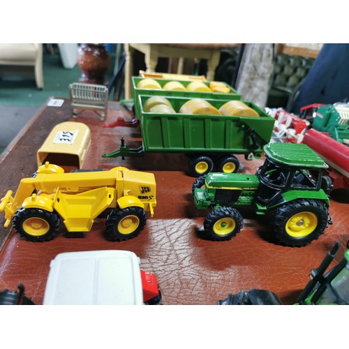 56e - Large collection of mostly diecast farm vehicles inc a good quantity of tractors and combine harvest... 