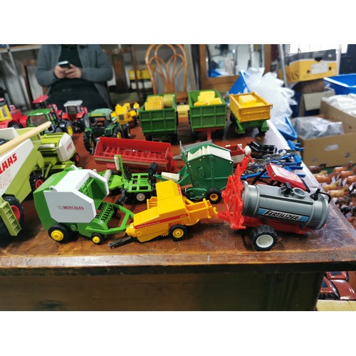 56e - Large collection of mostly diecast farm vehicles inc a good quantity of tractors and combine harvest... 