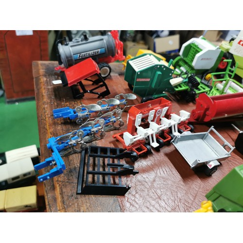 56e - Large collection of mostly diecast farm vehicles inc a good quantity of tractors and combine harvest... 