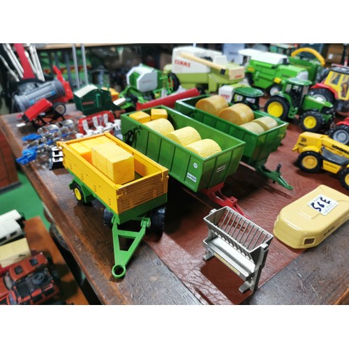 56e - Large collection of mostly diecast farm vehicles inc a good quantity of tractors and combine harvest... 