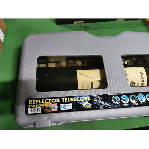 51 - Cased reflector telescope complete with a tripod for a telescope