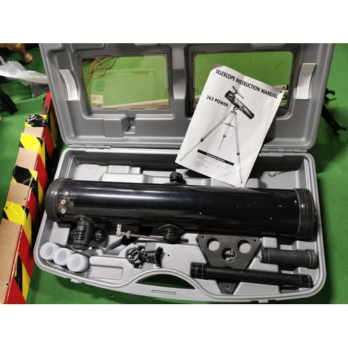 51 - Cased reflector telescope complete with a tripod for a telescope