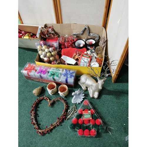 36 - Two boxes full of Christmas decorations including a gold glitter reindeer, baubles, tree decorations... 