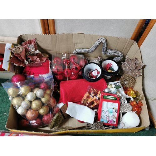 36 - Two boxes full of Christmas decorations including a gold glitter reindeer, baubles, tree decorations... 