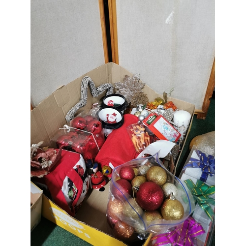 36 - Two boxes full of Christmas decorations including a gold glitter reindeer, baubles, tree decorations... 