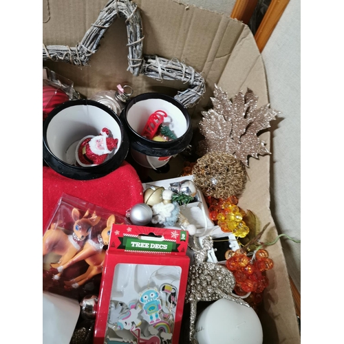 36 - Two boxes full of Christmas decorations including a gold glitter reindeer, baubles, tree decorations... 