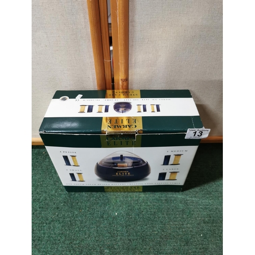 13 - Boxed new Carmen Elite steam heated hair rollers