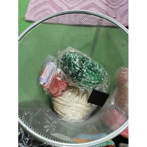 49 - Metal waste bin full of crochet hats and knitting wool
