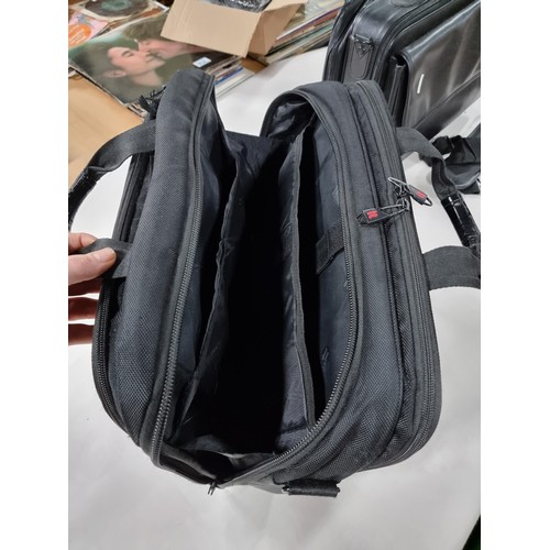 406 - 2 x laptop bags inc a leather laptop bag by Cosmac, and a laptop bag by IT, both in good order , the... 