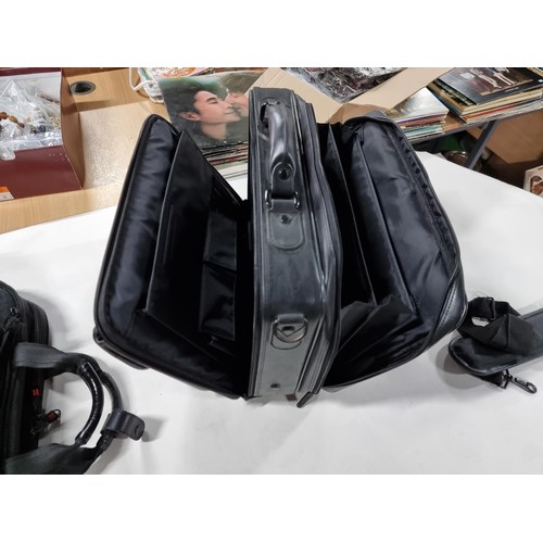 406 - 2 x laptop bags inc a leather laptop bag by Cosmac, and a laptop bag by IT, both in good order , the... 