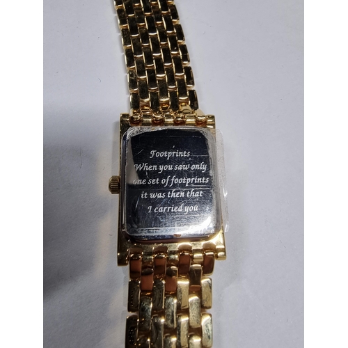 295 - Brand new old stock brooks & Bentley gold plated footprints in the sand ladies watch with a 1g ingot... 