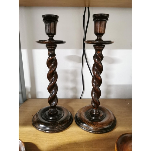 147 - Two pairs wooden candle sticks