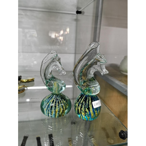 170 - 2 Mdina glass sea horse formed paperweights in good condition