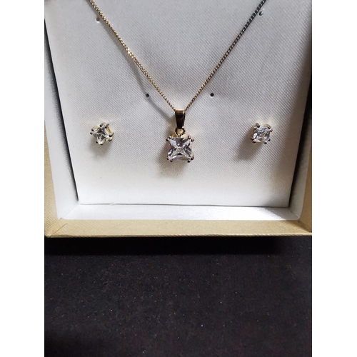 260 - Matching gold plated on 925 sterling silver pendant chain and earrings inset with large CZ stones ch... 