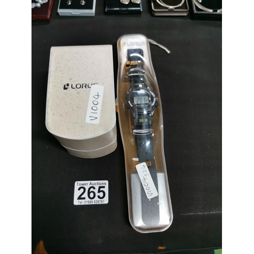 265 - Cased gents lorus digital watch lalong with a boxed ladies lorus watch both in excellent condition