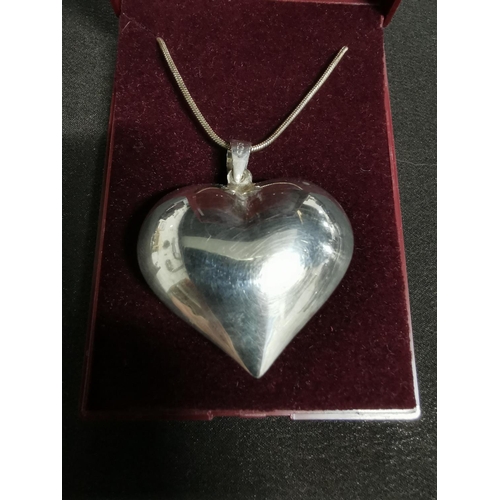 267 - Large 925 silver heart formed pendant on a long 925 silver chain height of pendant 4cm width 4cm tot... 