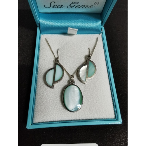 269 - Boxed as new 925 silver and MOP pendant earring set by pure original C Gems in their original box pe... 