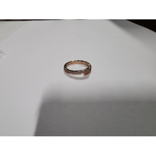 37 - Brand new direct from store Pandora Rose gold sparkling overlapping ring. Marked ALE MET, size O 1/2