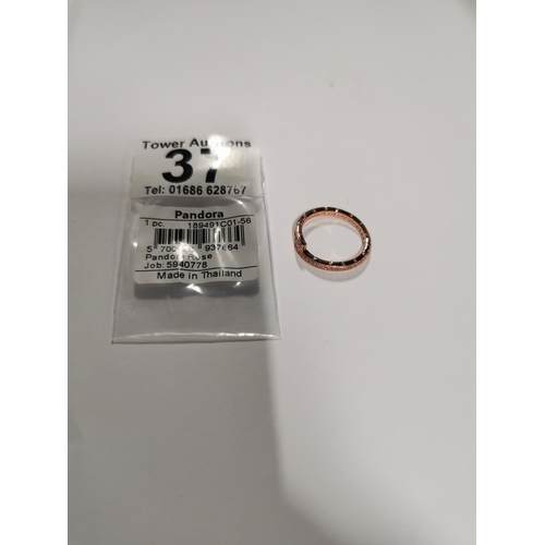 37 - Brand new direct from store Pandora Rose gold sparkling overlapping ring. Marked ALE MET, size O 1/2