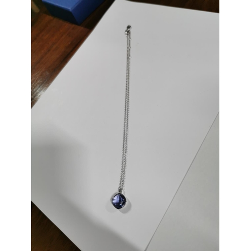 41 - Boxed Swarovski crystal purple cushion cut pendant on a 17