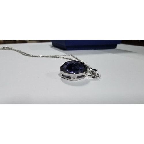 41 - Boxed Swarovski crystal purple cushion cut pendant on a 17