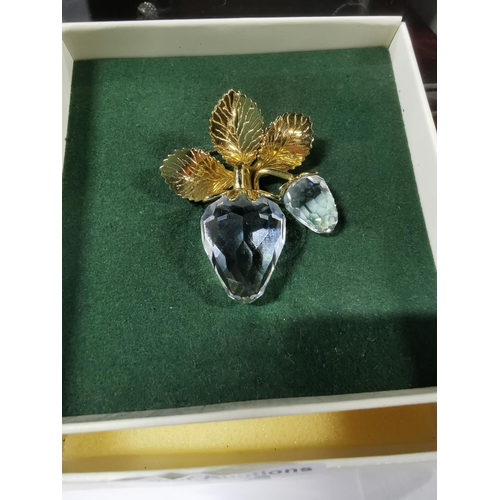 44 - Boxed Swarovski crystal memories brooch gold tone leaves and crystal strawberries in excellent condi... 