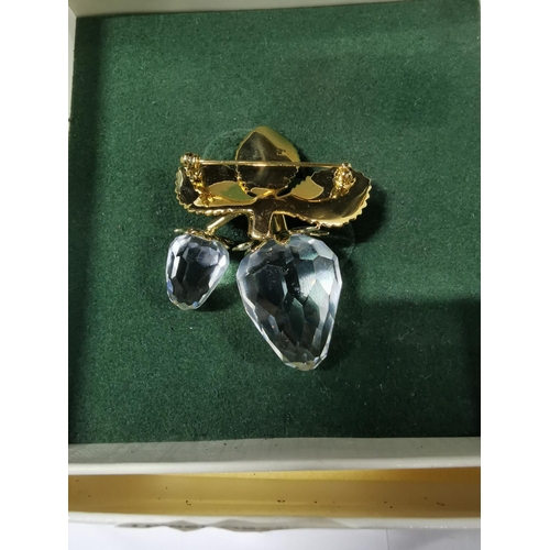 44 - Boxed Swarovski crystal memories brooch gold tone leaves and crystal strawberries in excellent condi... 