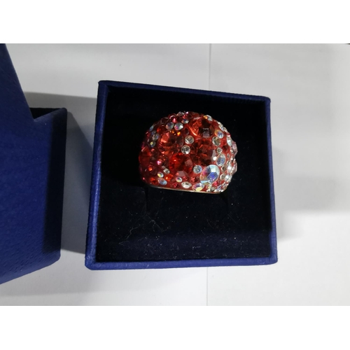 45 - Boxed Swarovski crystal chic dome ring - gold, red radiant to pale pink, size Q. In good condition w... 