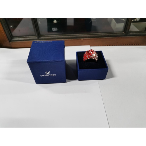 45 - Boxed Swarovski crystal chic dome ring - gold, red radiant to pale pink, size Q. In good condition w... 