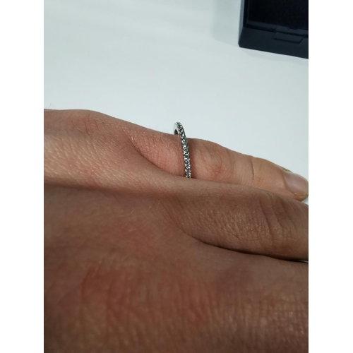 53 - Genuine Pandora ring inset with a large red stone and a quantity of clear stones all the way round t... 