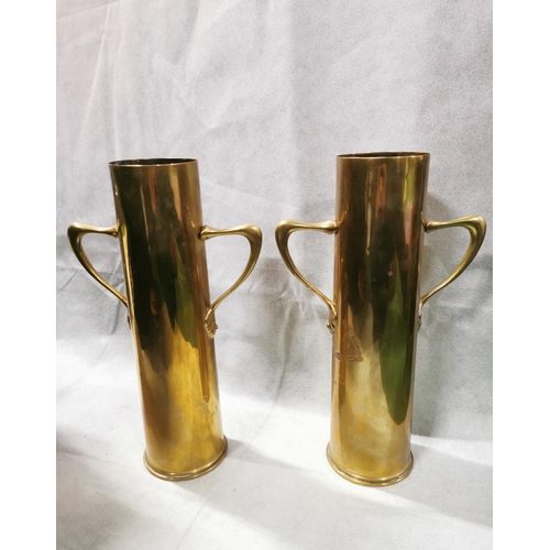 83 - Pair of superb quality brass trench art shells made into vases measures 31.5cm