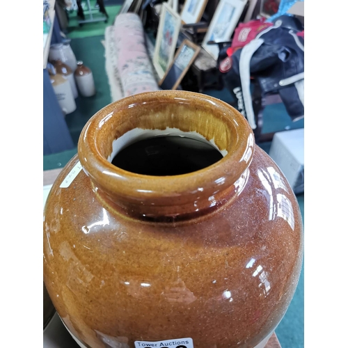 393 - Quantity of 4 stoneware storage jars. none have cork stoppers, all in good condition largest jar is ... 