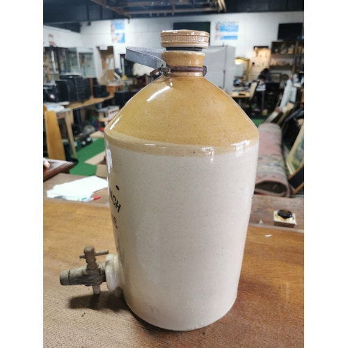 394 - Large stoneware flaggon with a wooden tap to the base, Style and Winch ltd Maidstone, height 43cm di... 