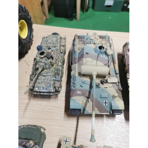 117 - Quantity of fully assembled model kits inc tanks and planes, also includes army figures