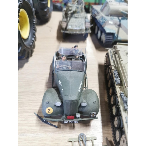 117 - Quantity of fully assembled model kits inc tanks and planes, also includes army figures