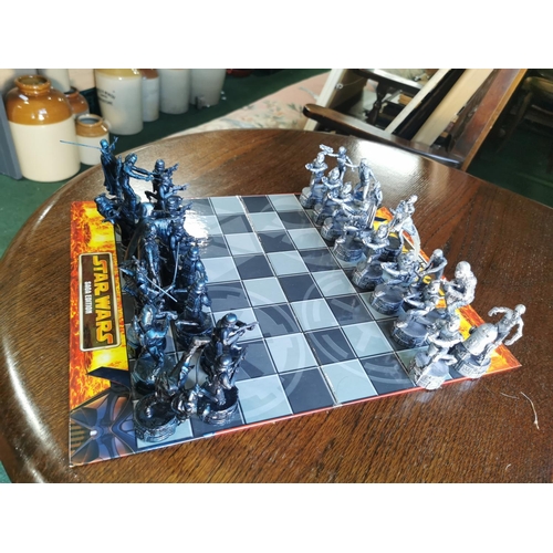 119 - X2 board games inc Star Wars chess set is complete  and Subbuteo table football game