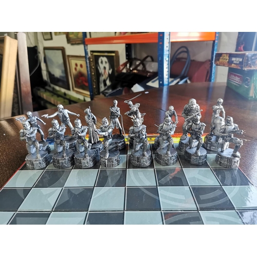 119 - X2 board games inc Star Wars chess set is complete  and Subbuteo table football game