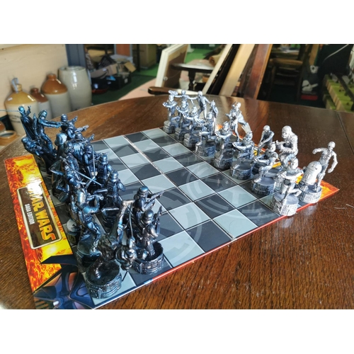 119 - X2 board games inc Star Wars chess set is complete  and Subbuteo table football game