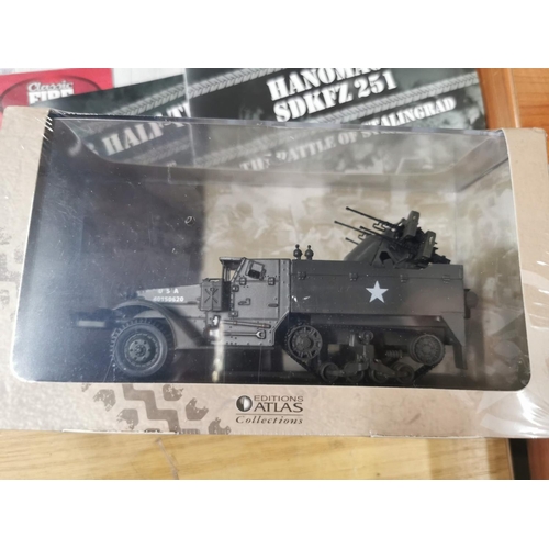 121 - 4X brand new and sealed military Diecast vehicles by Atlas Editions, complete with paperwork and DVD