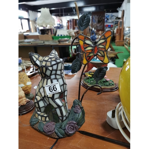 66 - Pretty tiffany style cat formed table lamp looking up at a butterfly, butterfly has an old fix in wo... 