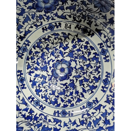 84 - Very large decorative blue and white ceramic bowl  18.5cm high, 41 cm diameter
2cm old repair
No pos... 