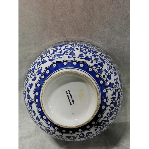 84 - Very large decorative blue and white ceramic bowl  18.5cm high, 41 cm diameter
2cm old repair
No pos... 